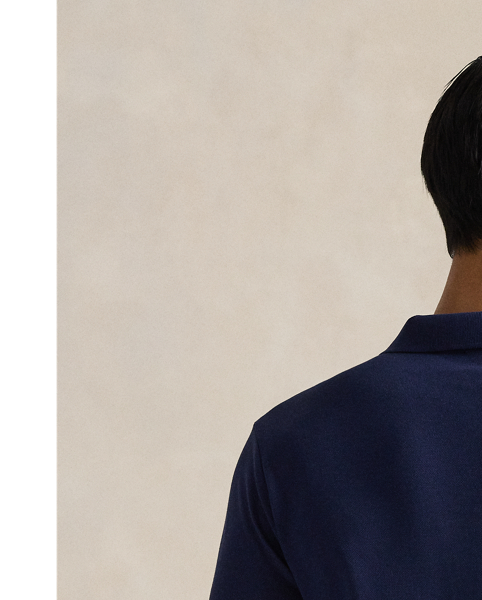An American style standard since 1972, the Polo shirt has been imitated but never matched. Over the decades,  Ralph Lauren Lauren has re-imagined his signature style in a wide array of colours and fits, yet all retain the quality and attention to detail of the iconic original. This version is cut slim through the body and washed for added softness.