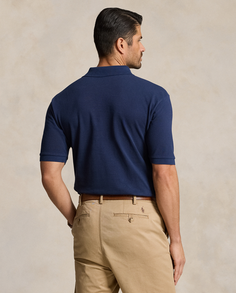 An American style standard since 1972, the Polo shirt has been imitated but never matched. Over the decades, Ralph Lauren Lauren has reimagined his signature style in a wide array of colors and fits, yet all retain the quality and attention to detail of the iconic original. This Big & Tall version is made from our highly breathable cotton mesh, which offers a textured look and a soft feel.