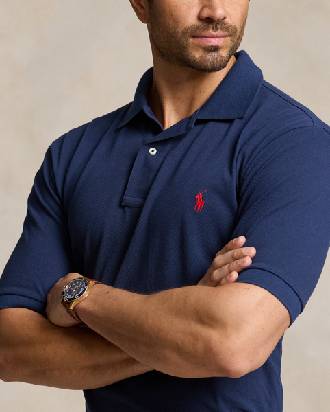 An American style standard since 1972, the Polo shirt has been imitated but never matched. Over the decades, Ralph Lauren Lauren has reimagined his signature style in a wide array of colors and fits, yet all retain the quality and attention to detail of the iconic original. This Big & Tall version is made from our highly breathable cotton mesh, which offers a textured look and a soft feel.