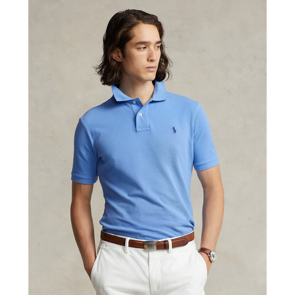 An American style standard since 1972, the Polo shirt has been imitated but never matched. Over the decades, Ralph Lauren Lauren has re-imagined his signature style in a wide array of colours and fits, yet all retain the quality and attention to detail of the iconic original. This version is cut slim through the body and washed for added softness.