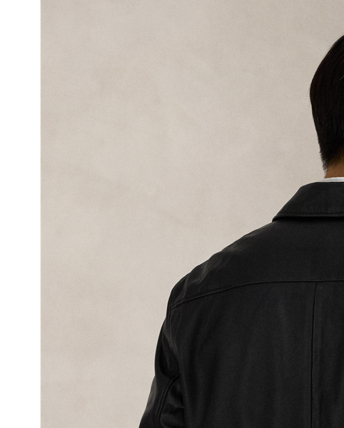 This jacket combines the sporty silhouette of a windbreaker with supple full-grain leather. Plaid lining gives it a heritage-inspired touch.