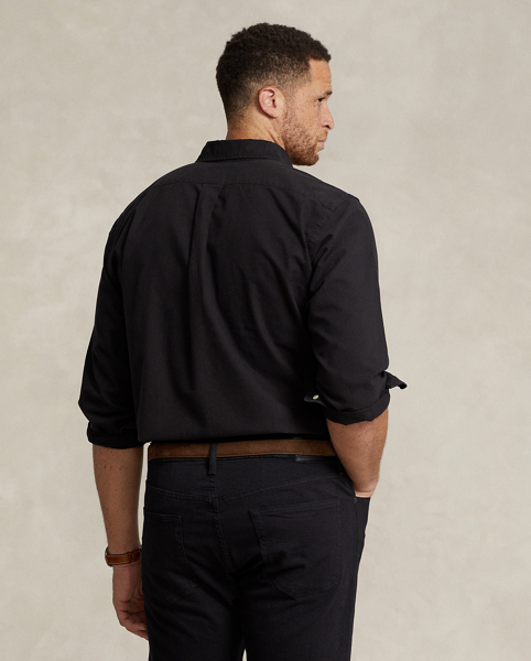 The oxford shirt made its debut very early in Ralph Lauren Lauren’s designs, and since then, it has solidified its status as a pillar of the Polo look. Our fabric is developed with a secret wash, which gives it instant character, ease and a heathered softness. The formula is so unique that it's been kept in a safe for more than three decades. In addition to details evoking its prep-school inspiration, it offers a relaxed feel, producing what we refer to as "the perfect rumple". Today, Mr Lauren continues to create countless variations of his iconic shirt, including this Big & Tall version, which is garment-dyed and finished with our signature embroidered Pony.