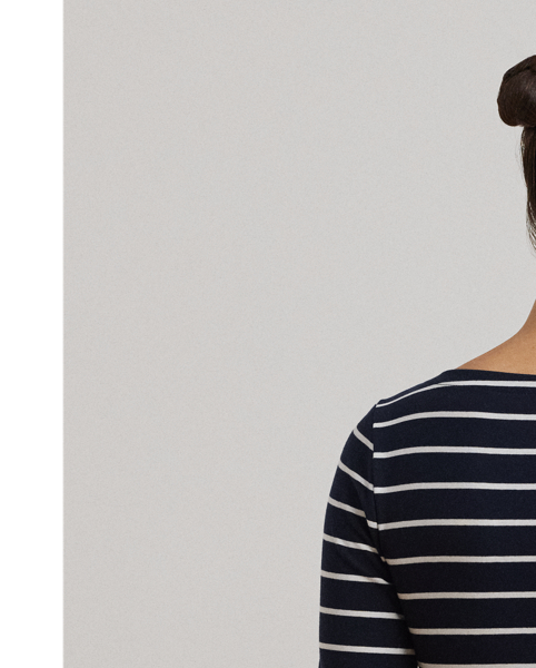 Made with soft stretch cotton, this essential boatneck tee features classic stripes.