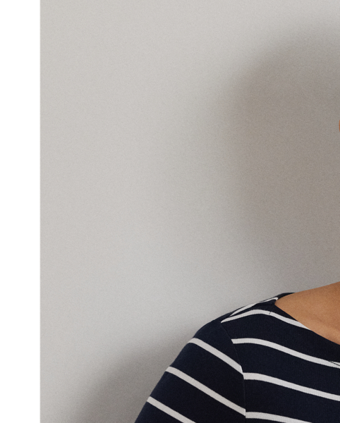 Made with soft stretch cotton, this essential boatneck tee features classic stripes.