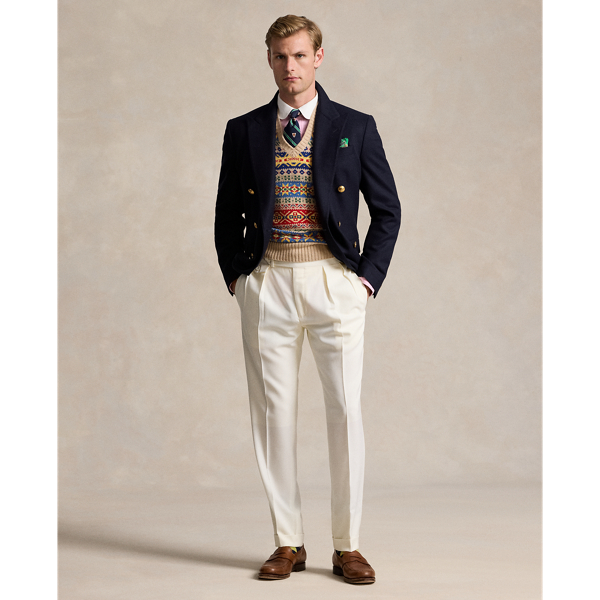 Masterfully crafted with impeccable attention to detail, these trousers showcase an Italian barathea cloth, which was custom-developed for  Ralph Lauren Lauren. The bespoke fabric, combined with precise tailoring and elegant pleating, creates a refined silhouette, which exemplifies sophisticated Polo style.