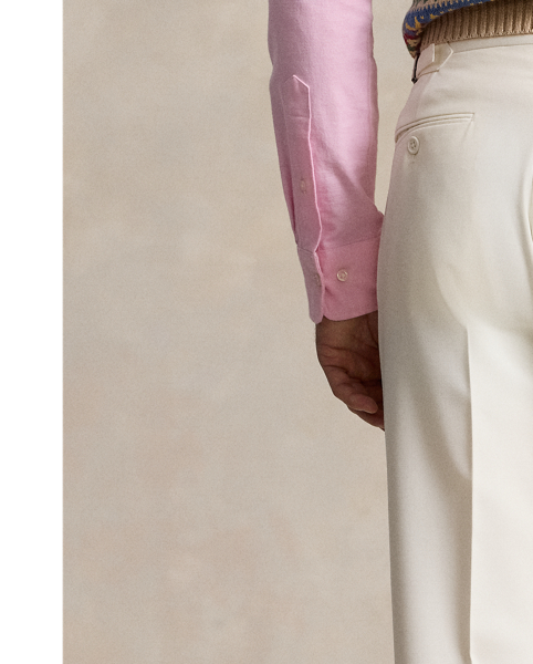 Masterfully crafted with impeccable attention to detail, these trousers showcase an Italian barathea cloth, which was custom-developed for  Ralph Lauren Lauren. The bespoke fabric, combined with precise tailoring and elegant pleating, creates a refined silhouette, which exemplifies sophisticated Polo style.