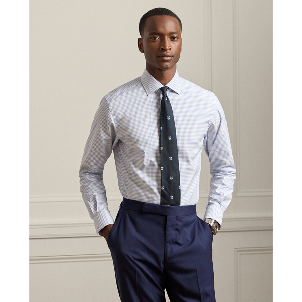 Made in Italy, this shirt showcases an elegant tattersall pattern on luxurious 140s-quality, two-ply cotton. The lightweight fabric is elevated by genuine mother-of-pearl buttons, reflecting Purple Label's commitment to exceptional materials and superior craftsmanship.