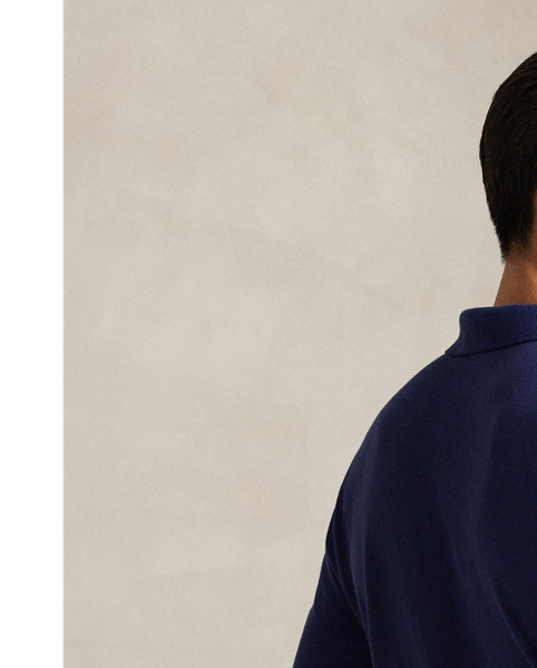 An American style standard since 1972, the Polo shirt has been imitated but never matched. Over the decades,  Ralph Lauren Lauren has re-imagined his signature style in a wide array of colours and fits, yet all retain the quality and attention to detail of the iconic original. This trim version is made from our highly breathable cotton mesh, which offers a textured look and a soft feel.