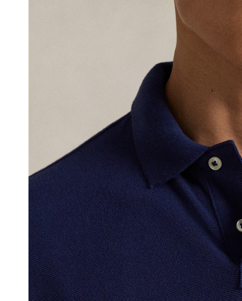An American style standard since 1972, the Polo shirt has been imitated but never matched. Over the decades,  Ralph Lauren Lauren has re-imagined his signature style in a wide array of colours and fits, yet all retain the quality and attention to detail of the iconic original. This trim version is made from our highly breathable cotton mesh, which offers a textured look and a soft feel.