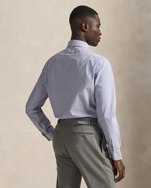 A multi-step process that includes high-tension yarn-spinning gives this shirt's pure cotton fabric a hint of stretch.
