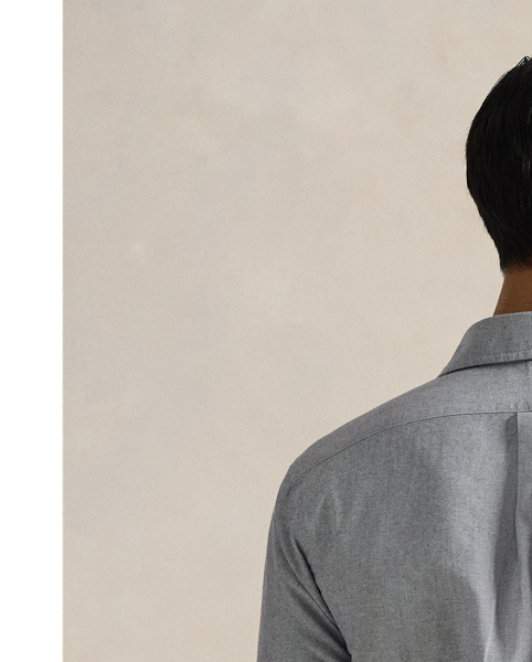 The oxford shirt made its debut very early in  Ralph Lauren Lauren’s designs, and since then, it has solidified its status as a pillar of the Polo look. Our fabric is developed with a secret wash, giving it instant character, ease and a heathered softness – what we refer to as "the perfect rumple". The formula is so unique that it's been kept in a safe for more than three decades. Today, Mr Lauren continues to create countless variations of his iconic shirt, including this Custom Fit version, which is embroidered with our multicoloured signature Pony.