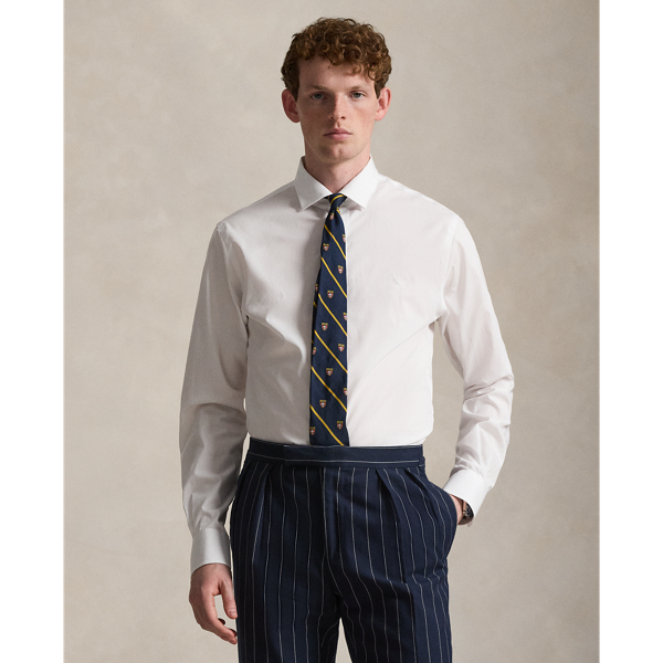 A multi-step process that includes high-tension yarn-spinning gives this shirt's pure cotton fabric a hint of stretch.