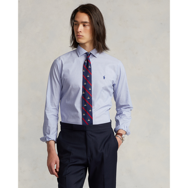 A multi-step process that includes high-tension yarn-spinning gives this shirt's pure cotton fabric a hint of stretch.