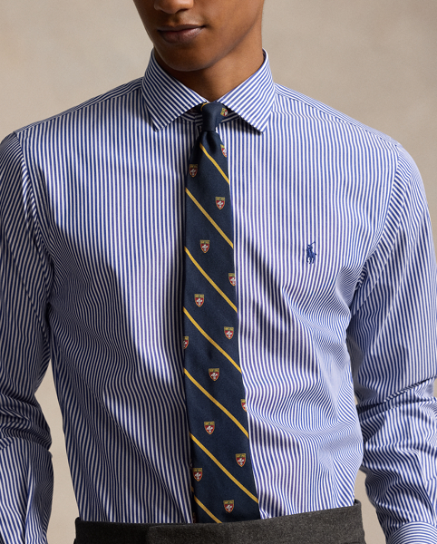 A multi-step process that includes high-tension yarn-spinning gives this shirt's pure cotton fabric a hint of stretch.