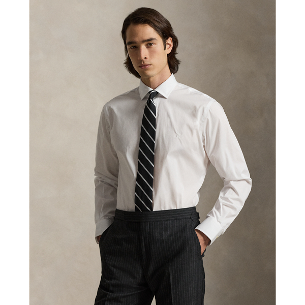 A multi-step process that includes high-tension yarn-spinning gives this shirt's pure cotton fabric a hint of stretch.