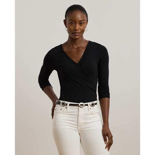 Figure-flattering ruching elevates the romantic appeal of this surplice jersey top, which is embroidered with Lauren's monogram for a signature finish.