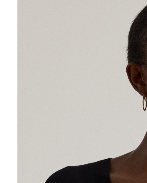 Figure-flattering ruching elevates the romantic appeal of this surplice jersey top, which is embroidered with Lauren's monogram for a signature finish.