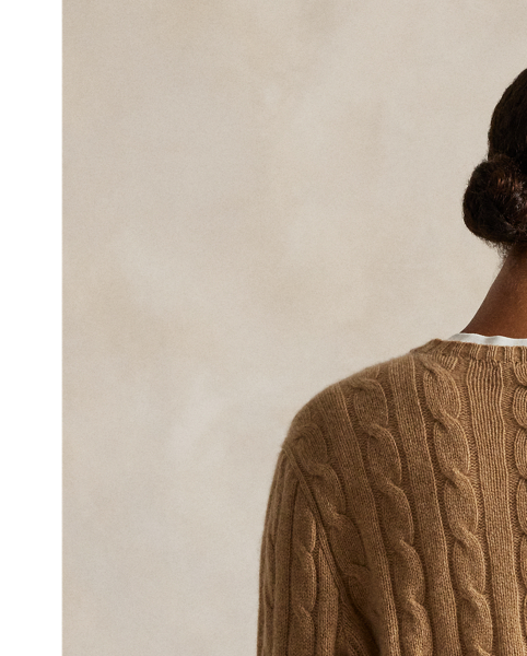 Inspired by fishermen's ropes, the cable-knit jumper's defining motif has transformed from a practical, hard-wearing construction into a symbol of collegiate style. This version is crafted from luxuriously soft cashmere, which is spun and dyed in a renowned Italian mill.