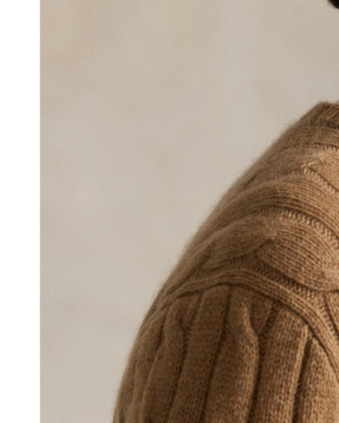 Inspired by fishermen's ropes, the cable-knit jumper's defining motif has transformed from a practical, hard-wearing construction into a symbol of collegiate style. This version is crafted from luxuriously soft cashmere, which is spun and dyed in a renowned Italian mill.