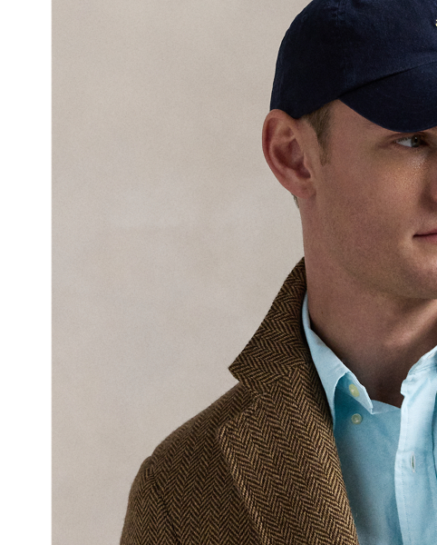 The oxford shirt made its debut very early in  Ralph Lauren Lauren’s designs, and since then, it has solidified its status as a pillar of the Polo look. Our fabric is developed with a secret wash, giving it instant character, ease and a heathered softness – what we refer to as "the perfect rumple". The formula is so unique that it's been kept in a safe for more than three decades. Today, Mr Lauren continues to create countless variations of his iconic shirt, including this Custom Fit version, which is embroidered with our multicoloured signature Pony.