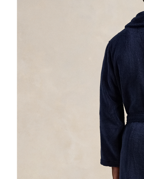 This plush cotton terry robe is designed with a shawl collar, self-belt and patch pockets. Our signature embroidered Pony accents the chest.