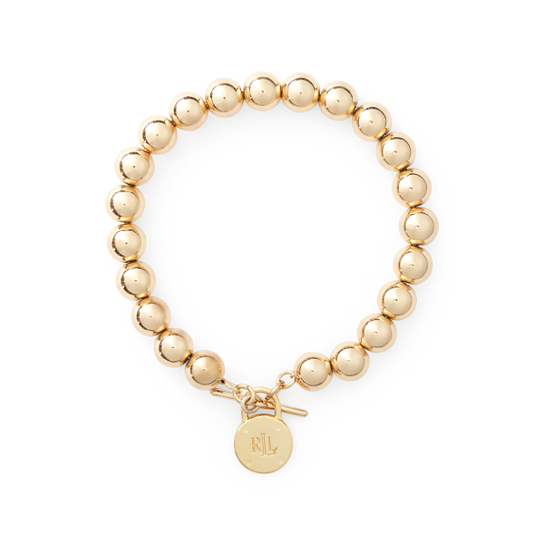 Bracelet à logo perlé doré