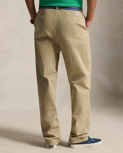 In soft cotton chino, these unisex trousers offer a classic Polo look with their relaxed, pleated silhouette.