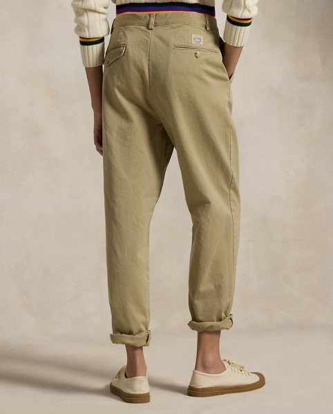 In soft cotton chino, these unisex trousers offer a classic Polo look with their relaxed, pleated silhouette.