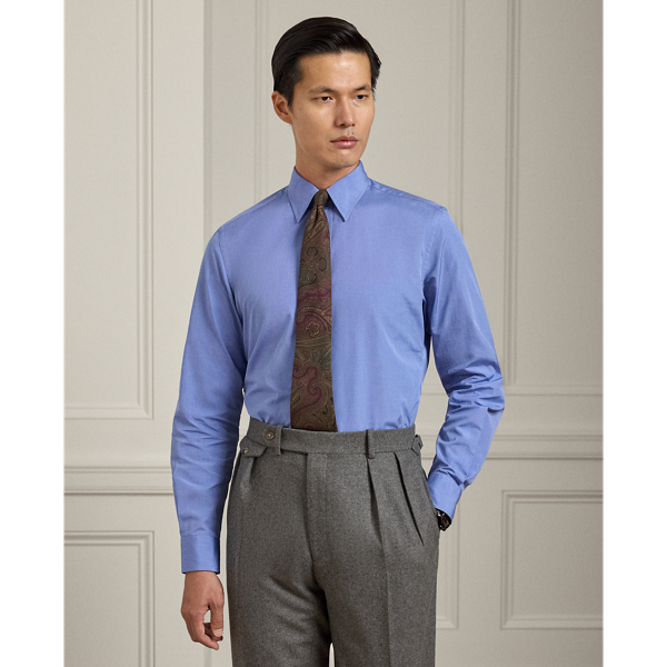 Made in Italy, this shirt exemplifies Purple Label's commitment to superior materials with its luxurious cotton fabric in a custom-developed blue hue. The sophisticated design is elevated by genuine mother-of-pearl buttons, reflecting our dedication to exceptional craftsmanship and meticulous attention to detail.