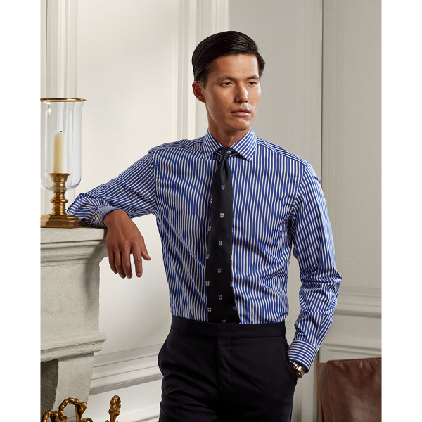 This shirt is crafted in Italy from a striped cotton fabric that is defined by its rich colour saturation. Genuine mother-of-pearl buttons provide a sophisticated finish.