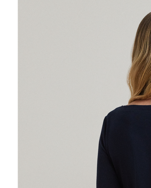 This timeless wardrobe staple is crafted with stretch-infused cotton and features an "LRL" monogram on the hem for a signature Lauren style.