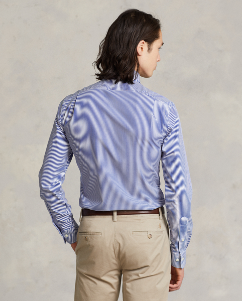 A multi-step process that includes high-tension yarn-spinning gives this shirt's pure cotton fabric a hint of stretch.