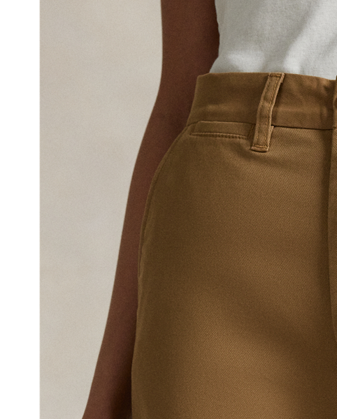 Cut in a wide-leg, cropped silhouette, these lightweight stretch-cotton twill trousers feature creases along the front and back leg.