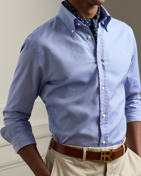 A masterwork of Italian crafting, this shirt reflects the uncompromising standards of Ralph Lauren Lauren Purple Label through its entirely bespoke development. From its distinctive custom-created hue to its precise construction specifications, every element has been meticulously engineered to achieve the pinnacle of sartorial excellence.