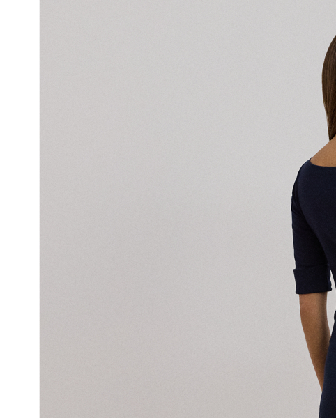 This fit-and-flare midi dress features a flattering boatneck and is crafted with soft, stretch-infused cotton, making it an effortless choice for everyday style.