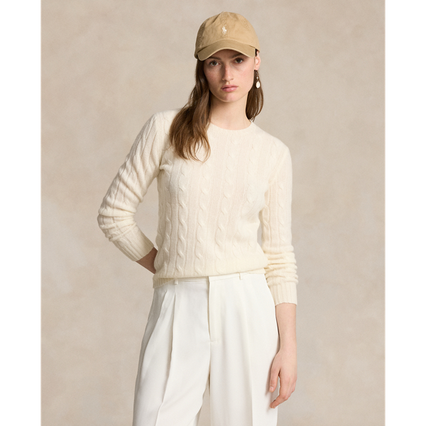 Inspired by fishermen's ropes, the cable-knit jumper's defining motif has transformed from a practical, hard-wearing construction into a symbol of collegiate style. This version is crafted from luxuriously soft cashmere, which is spun and dyed in a renowned Italian mill.