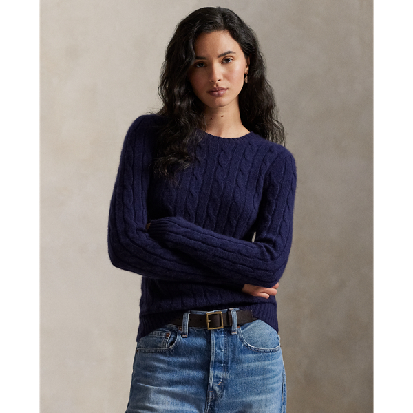 Inspired by fishermen's ropes, the cable-knit jumper's defining motif has transformed from a practical, hard-wearing construction into a symbol of collegiate style. This version is crafted from luxuriously soft cashmere, which is spun and dyed in a renowned Italian mill.