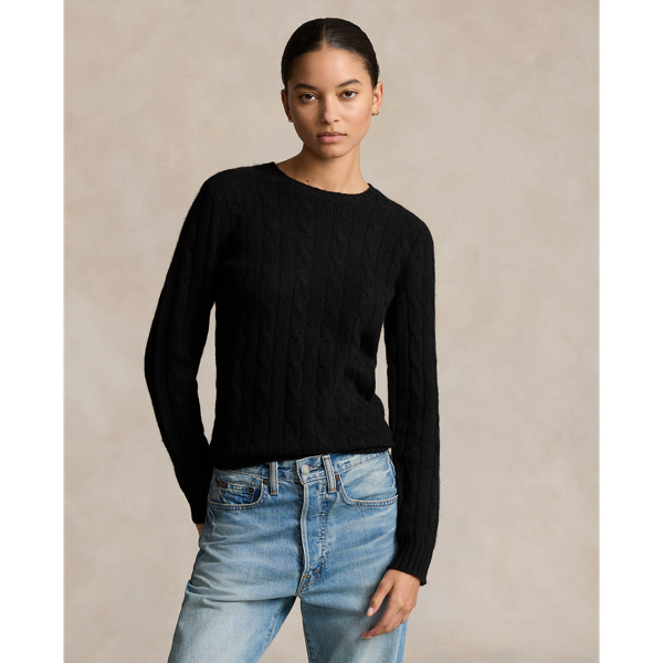 Inspired by fishermen's ropes, the cable-knit jumper's defining motif has transformed from a practical, hard-wearing construction into a symbol of collegiate style. This version is crafted from luxuriously soft cashmere, which is spun and dyed in a renowned Italian mill.
