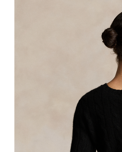 Inspired by fishermen's ropes, the cable-knit jumper's defining motif has transformed from a practical, hard-wearing construction into a symbol of collegiate style. This version is crafted from luxuriously soft cashmere, which is spun and dyed in a renowned Italian mill.