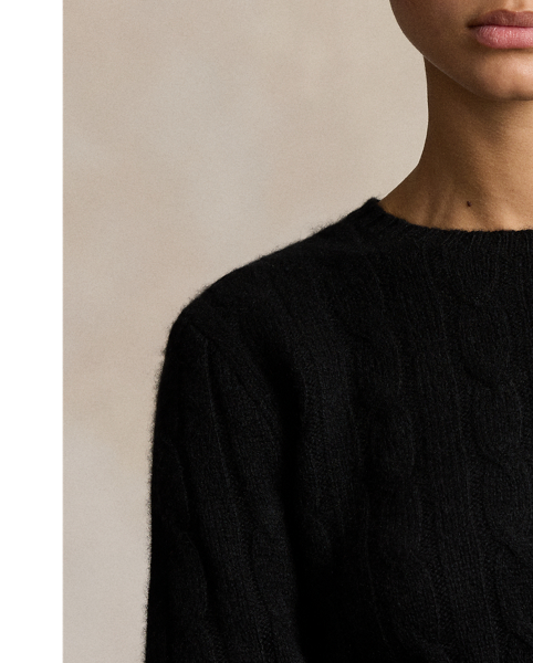 Inspired by fishermen's ropes, the cable-knit jumper's defining motif has transformed from a practical, hard-wearing construction into a symbol of collegiate style. This version is crafted from luxuriously soft cashmere, which is spun and dyed in a renowned Italian mill.