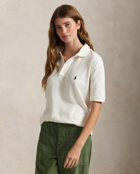 An American style standard since 1972, the Polo shirt has been imitated but never matched. Over the decades, Ralph Lauren Lauren has re-imagined his signature style in a wide array of colours and fits, yet all retain the quality and attention to detail of the initial icon. Treated for a timeworn look, this version is cut in our Original Fit, which is slightly more relaxed on the shoulder than our Classic Fit and has a longer back length.