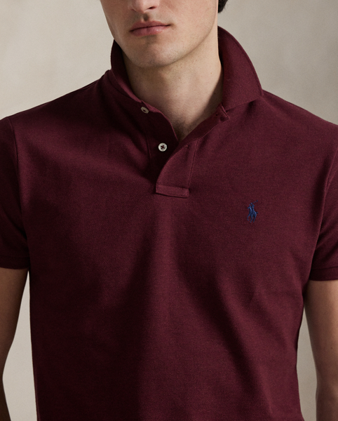 An American style standard since 1972, the Polo shirt has been imitated but never matched. Over the decades, Ralph Lauren Lauren has re-imagined his signature style in a wide array of colours and fits, yet all retain the quality and attention to detail of the iconic original. This trim version is made from our highly breathable cotton mesh, which offers a textured look and a soft feel.