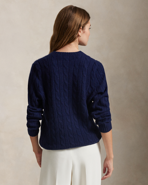 Our unisex cable-knit jumper is a Polo staple dating all the way back to 1973. What hasn't changed is the quality – 100% Italian cashmere – and the seamless way it is knit together. Known as hand-linking, this technique gives the piece an unmistakably attractive shape and soft feel.
