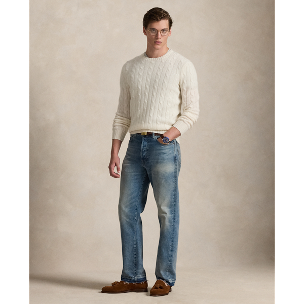 Our unisex cable-knit jumper is a Polo staple dating all the way back to 1973. What hasn't changed is the quality – 100% Italian cashmere – and the seamless way it is knit together. Known as hand-linking, this technique gives the piece an unmistakably attractive shape and soft feel.