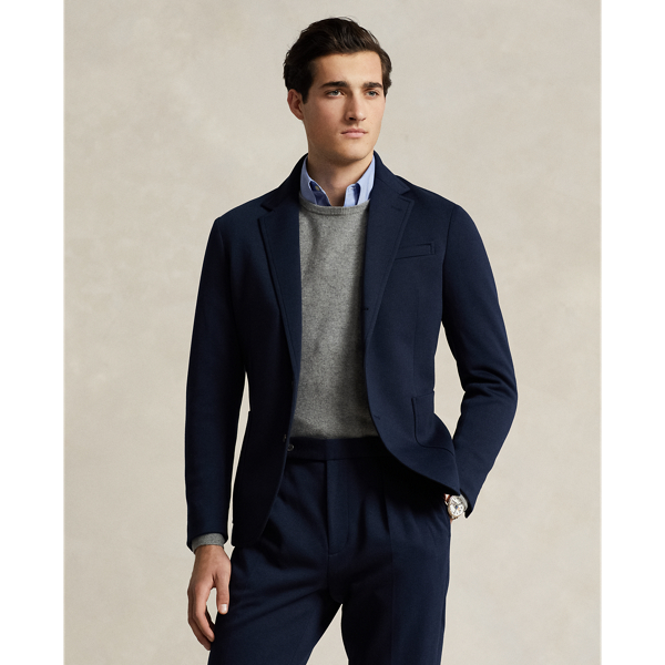 Our Polo Soft suit jacket puts a modern spin on classic preppy style with a natural shoulder, a slightly structured chest and partial lining. This version combines the look of traditional tailoring with the comfort of a cardigan thanks to its smooth double-knit fabric.