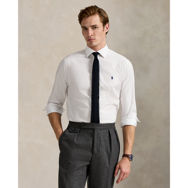 This stretchy shirt is made with cotton PUREPRESS™ technology, a durable press finish that provides wrinkle-resistance while reducing material strength loss and protecting against abrasion.