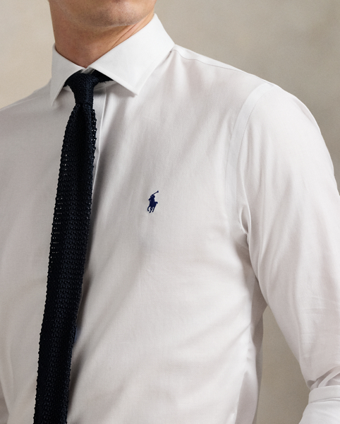 This stretchy shirt is made with cotton PUREPRESS™ technology, a durable press finish that provides wrinkle-resistance while reducing material strength loss and protecting against abrasion.