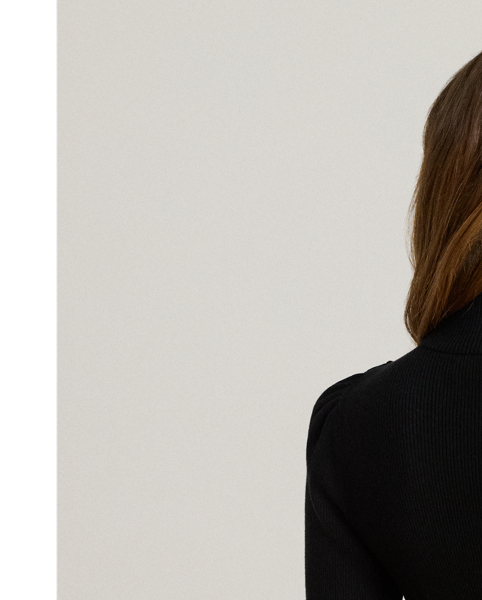 Crest-embossed buttons and puffed long sleeves enhance the elegance of this rib-knit mockneck jumper, which is rendered in a cotton blend for a soft hand.