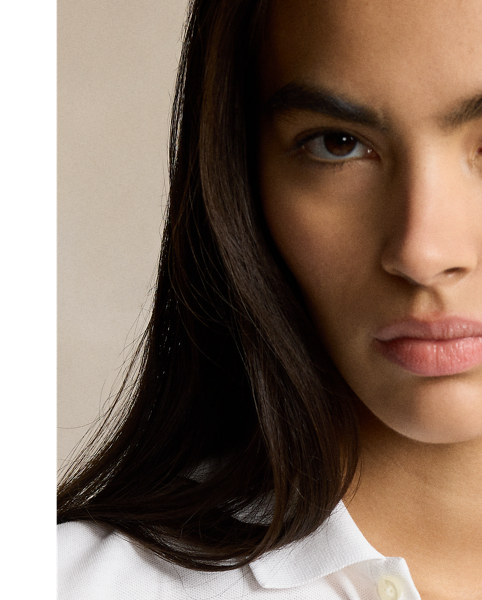 From its meticulous construction – our signature embroidered Pony requires a total of 982 individual stitches to produce – to its breathable cotton mesh fabric,  Ralph Lauren Lauren's Polo shirt has been an icon of American style since 1972. This version is made with a hint of stretch for comfort.