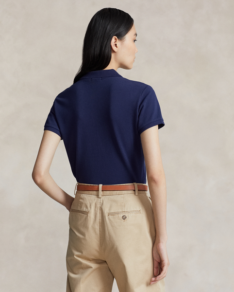 From its meticulous construction – our signature embroidered Pony requires a total of 982 individual stitches to produce – to its breathable cotton mesh fabric, Ralph Lauren Lauren's Polo shirt has been an icon of American style since 1972. This version is made with a hint of stretch for comfort.